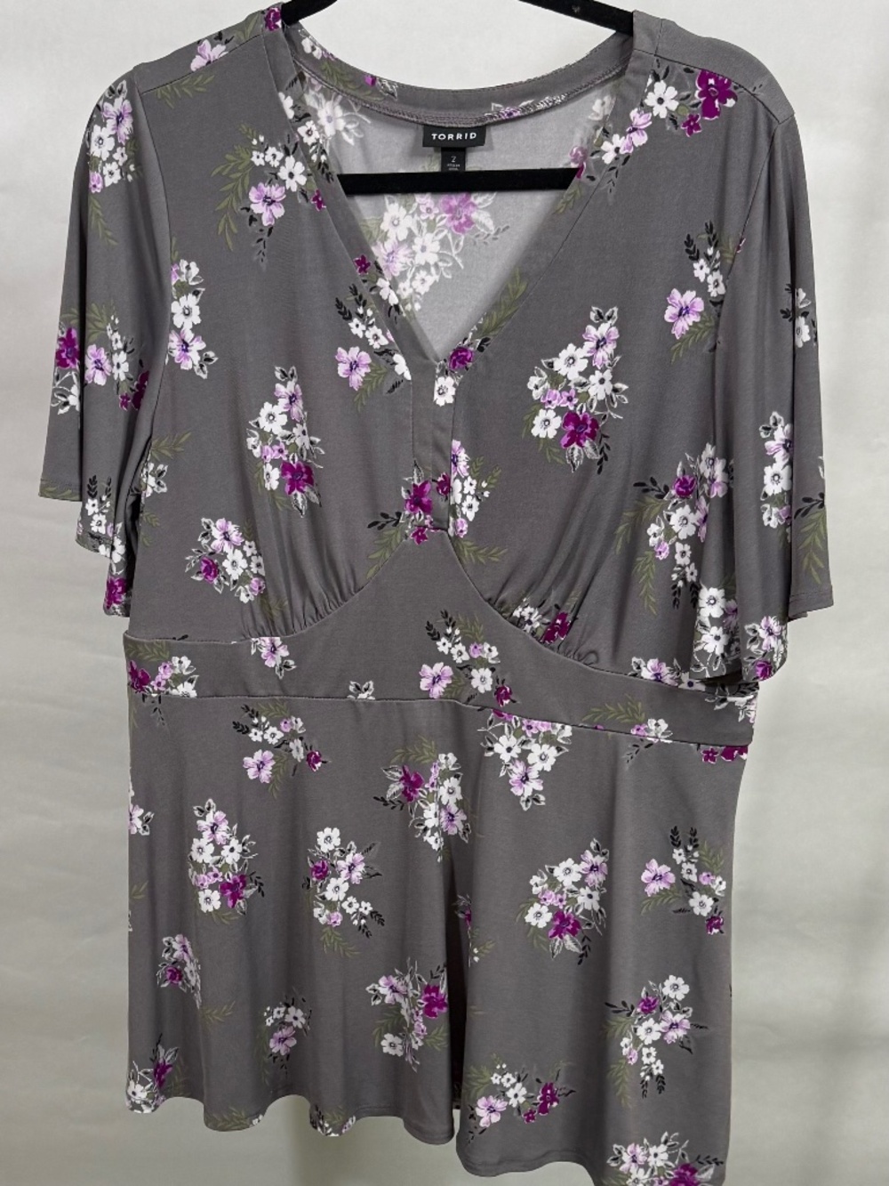 Torrid peplum gray blouse with little purple flowers size 2